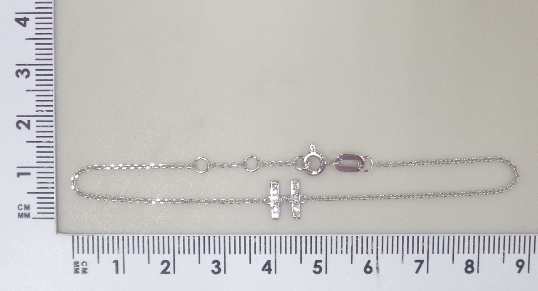 Браслет из белого золота с бриллиантами "Н"